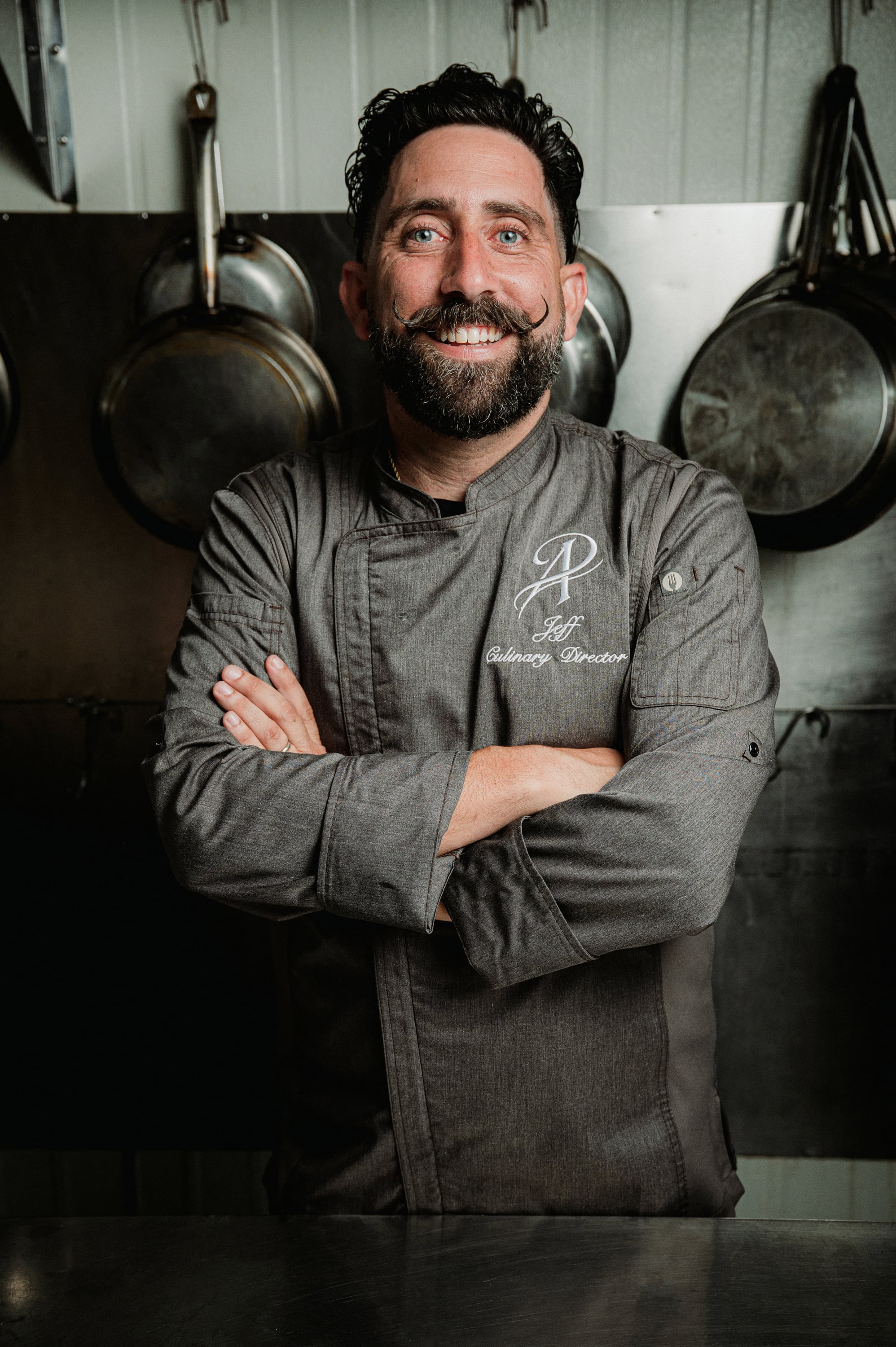 Chef Jeff Ardi with arms crossed in the kitchen
